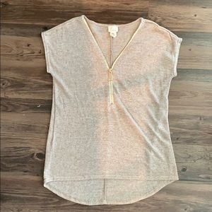 Knit top with gold zipper neckline